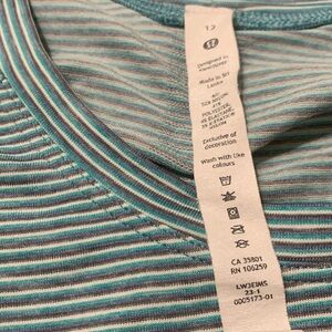 Swiftly T shirt by Lulu gently used size 12